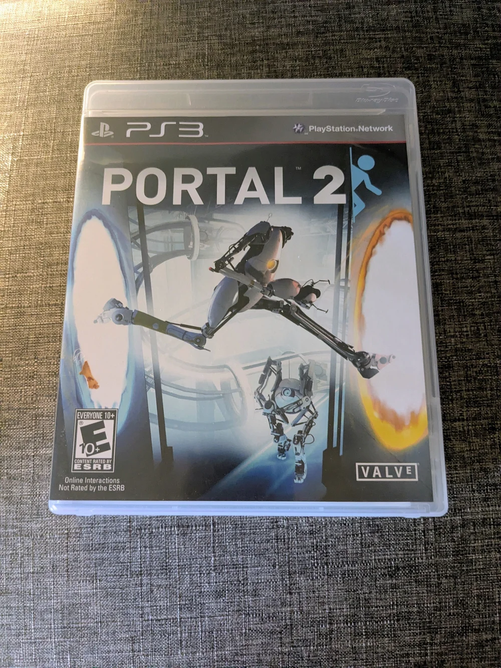Portal 2 (PS3) Video Game - White/Blue Cover by Valve